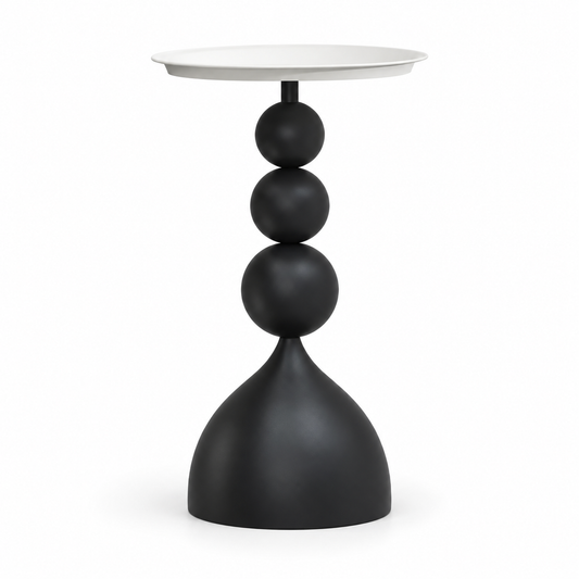 Table d’appoint haute noire avec plateau blanc et pied à trois sphères sur fond blanc