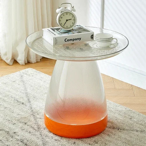 Table d’appoint transparente avec base orange et plateau rond