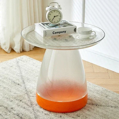 Table d’appoint transparente avec base orange et plateau rond