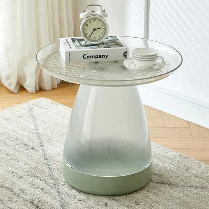 Table d’appoint vert clair avec finition translucide et plateau rond