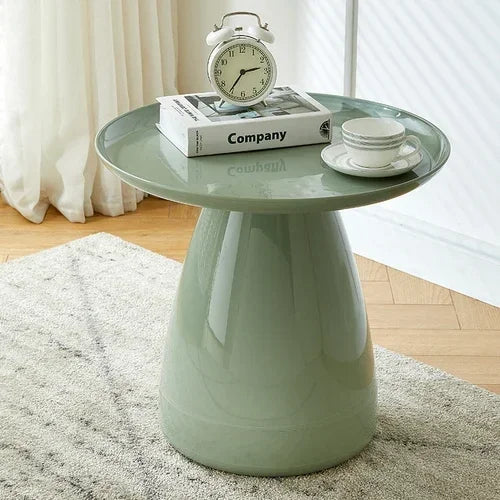 Table d’appoint vert sauge au design moderne avec pied sculptural