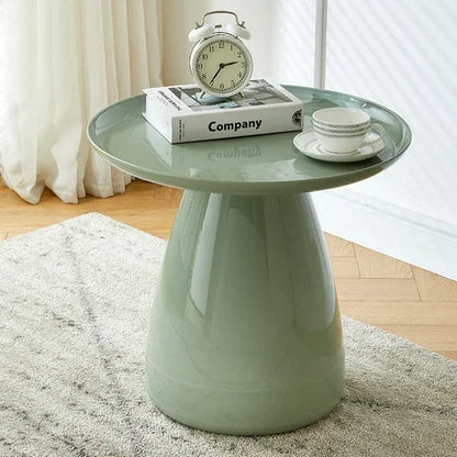 Table d’appoint vert sauge au design moderne avec pied sculptural